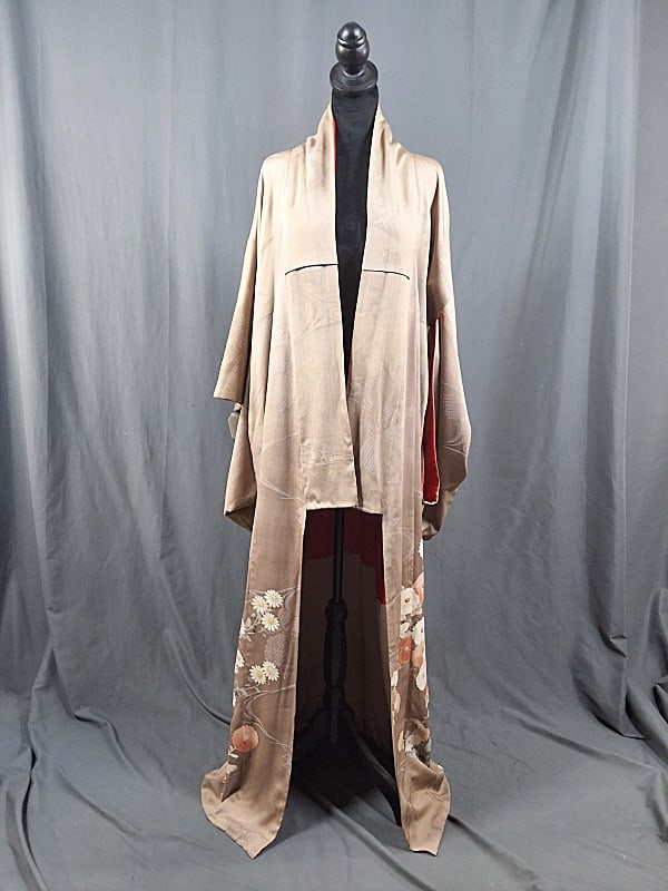 Vintage Taupe Kimono: Vintage Taupe Kimono. Featured is a silk kimono from Japan that has a taupe exterior and a blood orange lining. At the bottom of the kimono there are a variety of flowers including chrysanthemums, plu