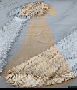 Antique 19th c. Wedding Dress and Veil: Antique 19th c. Wedding Dress and Veil. The lot consists of an antique 19th century wedding dress and veil. Featured is an antique short sleeved wedding dress from the late 19th century with a lace sh