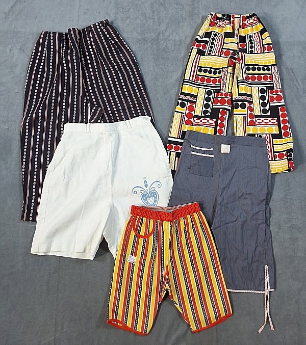 5 Pairs of Vintage c1960 Girls Shorts: Fives Pairs of Vintage c1960 Girls Shorts. The lot consists of five pairs of vintage girls shorts c1960. Featured are five pairs of vintage c1960 girls shorts and pedal pushers in a mix of solids and 