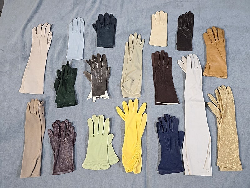 17 Pairs of Colorful Vintage Gloves: 17 Pairs of Colorful Vintage Gloves. The lot consists of 17 pairs of colorful vintage gloves. Featured are 17 pairs of colorful vintage gloves in colors such as green, grey, brown, yellow, blue, white