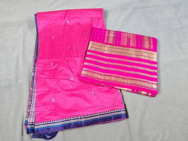 2 Pink South Asian Sarees: Two Pink South Asian Sarees. The lot consists of two pink South Asian sarees. Featured are two pink South Asian sarees with one in hot pink and the other fuchsia with the latter being from Sugnamall S