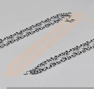 Early 20th Century Solid 10K Bracelet: Early 20th Century Solid 10K Bracelet. The lot includes a 6.5'' L x .84'' W early 20th century solid 10K yellow gold bracelet comprised of an elongated oval loop of curb link chain with attached elong