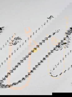 2,19th Century Gold Filled Watch Chains: 2,19th Century Gold Filled Watch Chains. The lot includes a pair of late 19th century gold filled watch chains with fobs. Featuring a 14'' long modified cub link watch chain by Gel & Co with a pocket