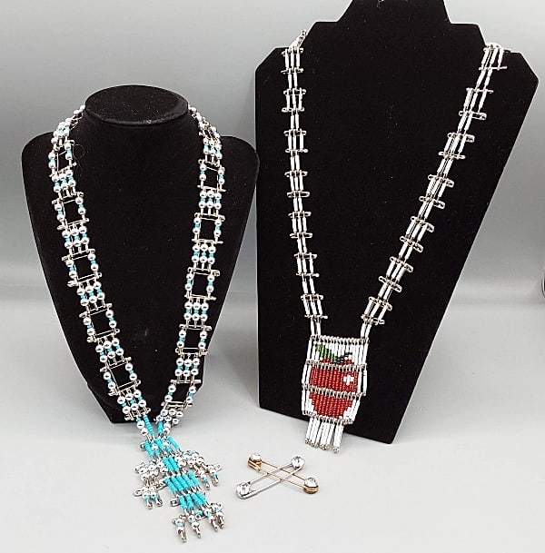 Pair of Vintage 70s Safety Pin Necklaces and More: Pair of Vintage 70s Safety Pin Necklaces and More. The lot includes a pair of vintage 1970s safety pin necklaces from New York and more. Featuring a 30'' long silver tone necklace made of safety pins 