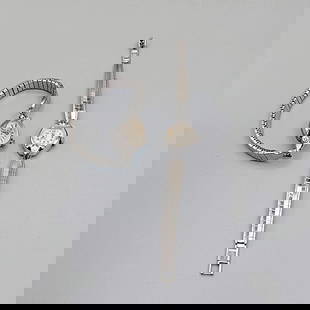 Pair of Vintage Silver Tone Ladies Wrist Watches: Pair of Vintage Silver Tone Ladies Wrist Watches. The lot includes a pair of vintage mid century ladies silver tone mechanical wrist watches. Featuring a rounded marquise shaped ladies mechanical wris