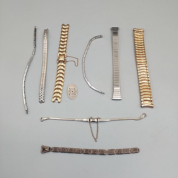 Group of Vintage Watch Straps-12K GF and More: Group of Vintage Watch Straps-12K GF and More.The lot includes a mix of vintage silver and gold tone watch straps. Featuring a 5.5'' long 12K yellow gold filled accordion style stretch strap by Eton. 