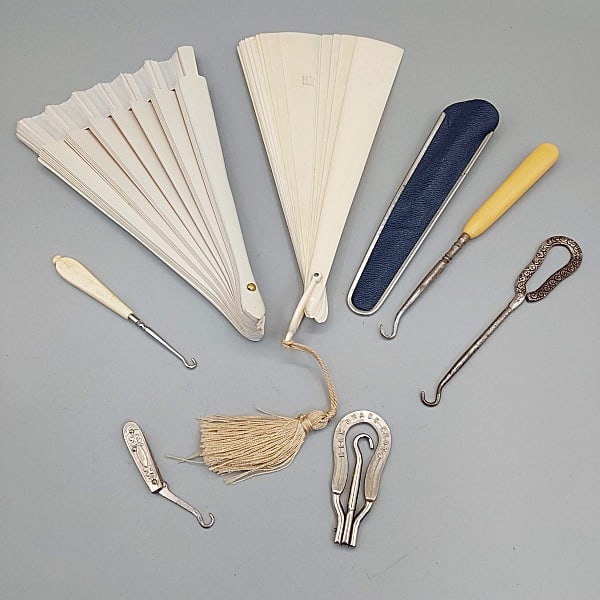 Vintage/Antique Fans and Button Hooks: Vintage/Antique Fans and Button Hooks. The lot includes a mix vintage and antique hand fans and button hooks. Featuring an early 2oth century hand fan made of polished bone plaques attached with ribbo