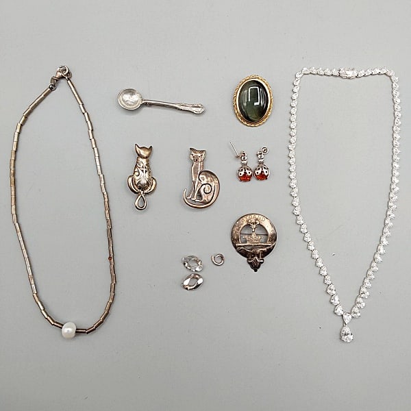 Group of Vintage Necklaces, Brooches, and Earrings - Bettina Duncan: Group of Vintage Necklaces, Brooches, and Earrings. Includes a 16" necklace with silver tubular beads in a single liquid silver strand and a freshwater pearl in the center, signed Bettina Duncan and m