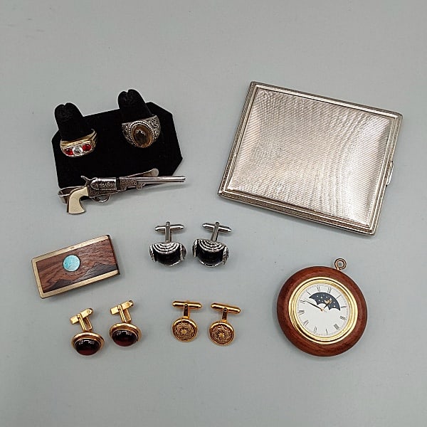 Vintage Mens Group: Rings, Cufflinks: Vintage Men's Group with an Evans Nickel Silver Cigarette Case, a wood watch (not running), Money Clip with wood and turquoise inlay marked Sky West 1983, a pistol shaped tie clip, 3 pairs of cufflink