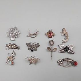 11 Silver Brooches