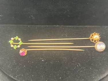 Four Gold Stick Pins