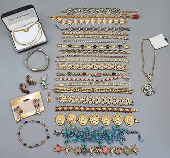Costume Jewelry Assortment: Lot to include 29 pieces of costume jewelry, mostly bracelets – some signed. Included is a scarab bracelet, a Kirk’s Folly star bracelet, a jointed bear pendant, a necklace and bracelet set with g