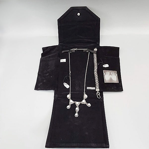 Sterling Necklace and Bracelet: A 19" sterling necklace with pearls, includes necklace case and a 7.5" bracelet, both marked Suarti Bali. (Bracelet weighs 32g) If you have any doubt, please ask questions! We will provide extra pictu