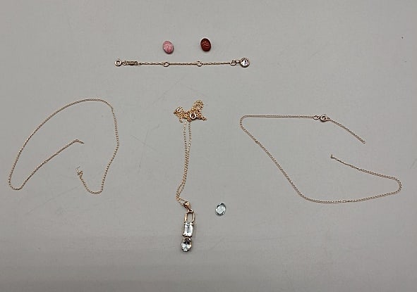 Aquamarine and Scrap Gold: A marked 14K yellow-gold KNOTTED necklace with tested 14K white-gold pendant with 3 aquamarines (One aquamarine is out of the setting); Also included, is a marked 14K yellow-gold pendant or drop with