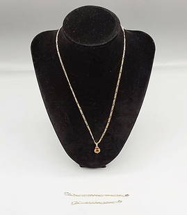 14K Necklace and Pendant: A marked 14K yellow-gold 17 1/2" figaro chain necklace with a 3" and a 4" extender, plus a 3/4" marked pendant with citrine (Weight of chains 6.10g, Weight of Pendant with stones 1.4g) If you have any