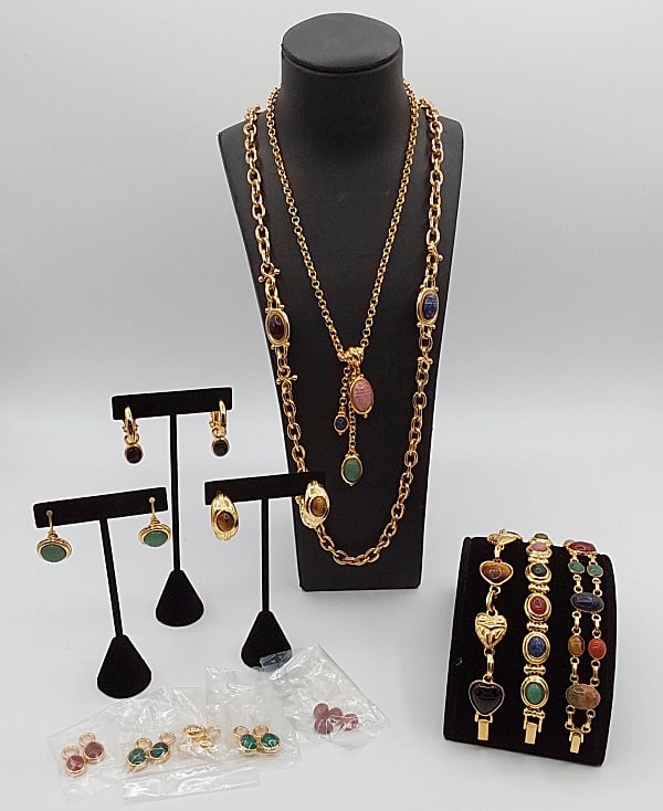 8 Pieces of Scarab Jewelry: Eight pieces of scarab jewelry to include: an unmarked gold-tone bracelet with etched stone cabochons etched on both sides with onyx, tiger's eye, lapis, unakite, rhodochrosite, bloodstone, carnelian
