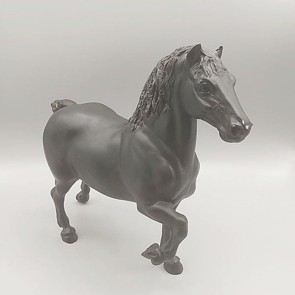 Breyer Black Belgian Horse #94BL: Breyer Belgian Horse #94BL. Traditional Breyer horse in original semi gloss solid black finish with white and red tail ribbon, purchased by consignor through M. H. Collector's Supply Company in 1987, 