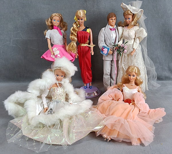 5 Barbie Dolls and 1 Ken Doll - Wedding Party and more: 5 Barbie Dolls and 1 Ken Doll. There are 5 Barbie dolls and 1 Ken doll and a Skipper that are included in this lot with each not having their packaging, all loose. Happy Holidays Barbie c1989 is inclu