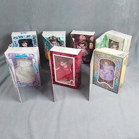 7 Holiday Marie Osmond Porcelain Dolls