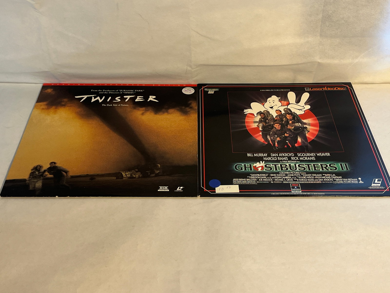 2 LASER DISCS GHOSTBUSTERS 2 AND TWISTER: TWISTER THE DARK SIDE OF NATURE & GHOSTBUSTERS II