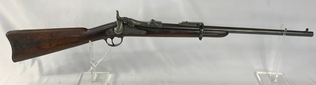 34051-SPRINGFIELD 1873 CARBINE: SPRINGFIELD 1873 CARBINE - 45/70, BORE IS NICE, FEW SMALL PITTED SPOTS, SHOULD STILL BE A GREAT SHOOTER, METAL FINISH HAS PATINA & THINNING, SOLID STOCK-COUPLE OF GOUGES (SN# 319556)