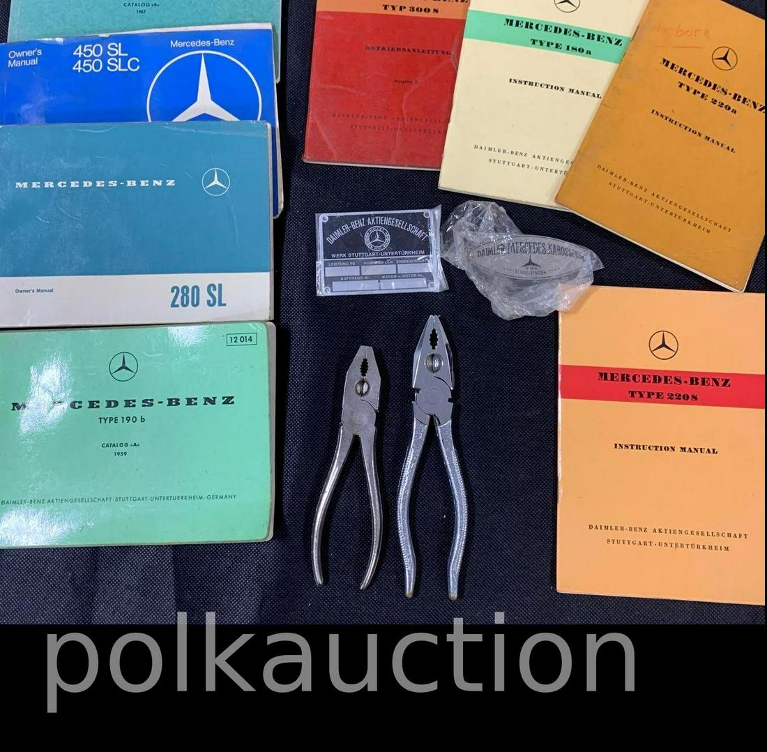 Box of Mercedes-Benz Manuals, Badges & Pliers (1 of 1)