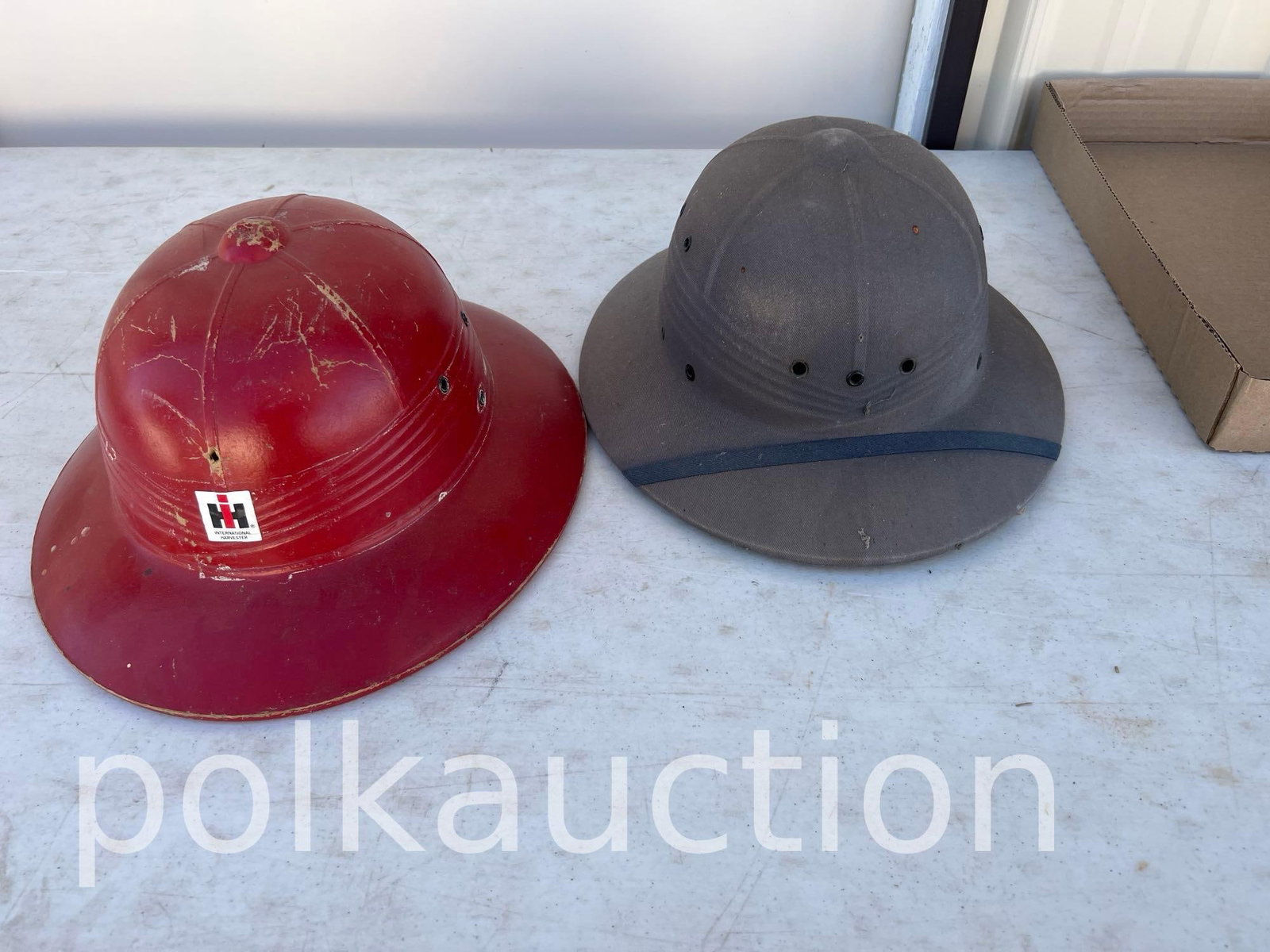 2581-(2) IH PYTHE HELMETS: .