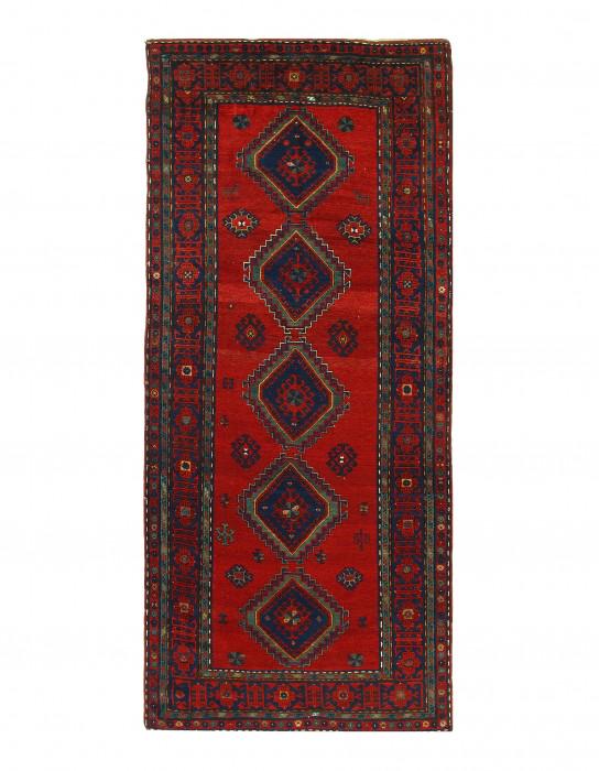 Red Russian Antique Kazak Runner 5'5'' X 12'4'': Red Russian Antique Kazak Runner 5'5'' X 12'4''. Antique Lamb's Wool Hand-Knotted 300-E03270-862. This item is part of our fine auction collection which includes many fine home accessories including a