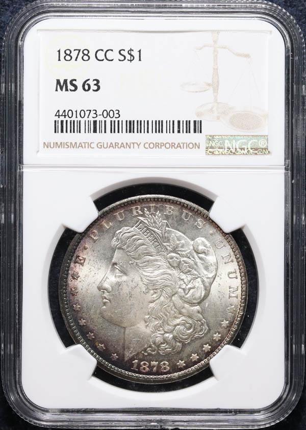 1878-CC Morgan Dollar NGC MS-63: 1878-CC Morgan Dollar. Light toning. NGC graded MS-63. Greysheet $425.