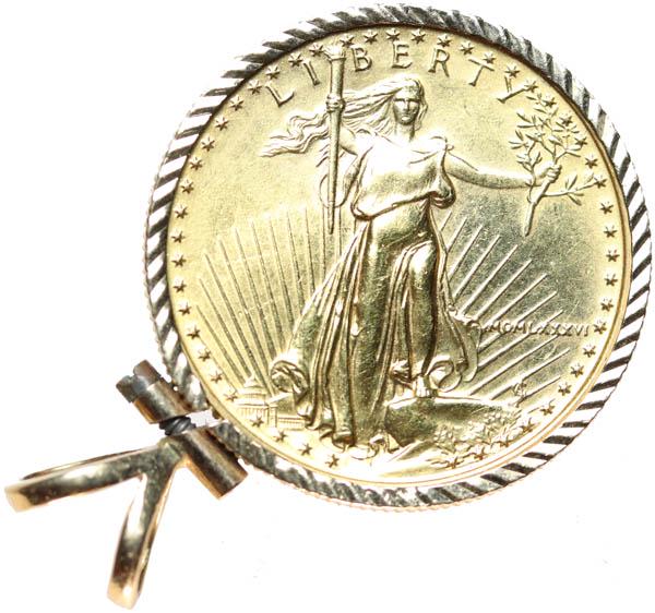 1986 $10 Quarter-Ounce Gold: 1986 $10 quarter-Ounce Gold. In bezel for jewelry use. Uncirculated.
