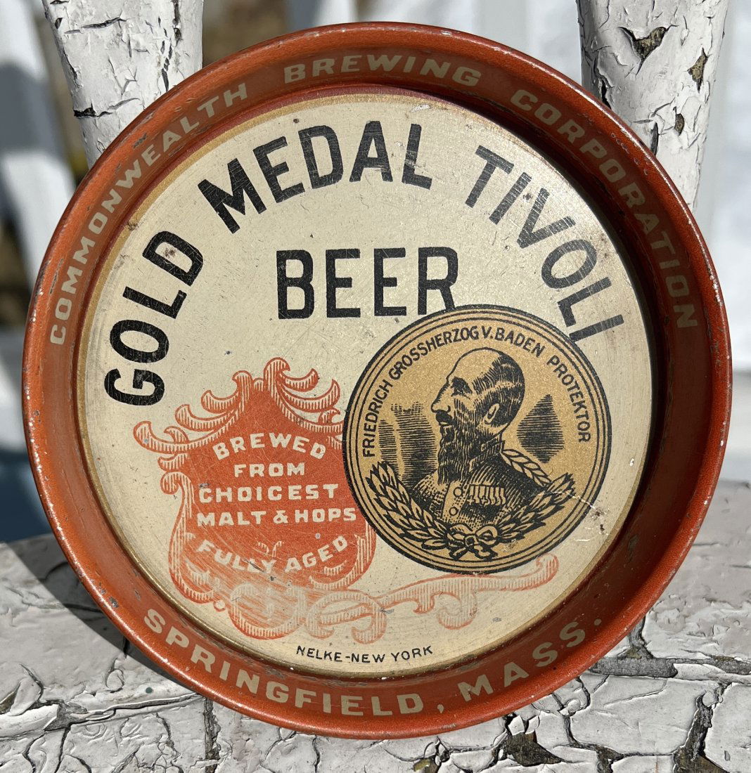 Commonwealth Brewing Brewery Advertising Tivoli Beer Tip Tray - Springfield, Mass.: Commonwealth Brewing Brewery Advertising Gold Medal Tivoli Beer Tip Tray - Springfield, Mass. From a long time single owner Breweriana Collection. Please note this is a timed online only auction and e