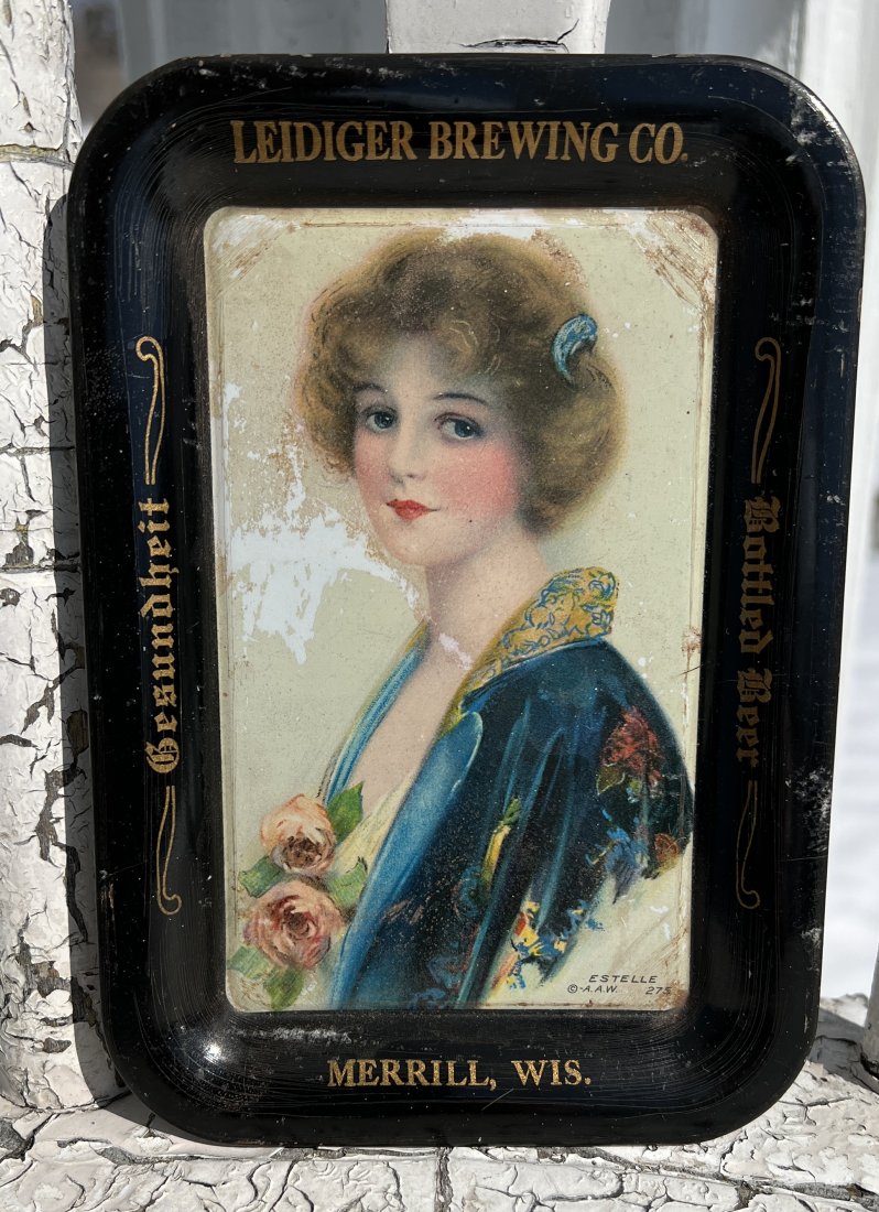 Advertising Beer Tip Tray - Leidiger Brewing Co - Merrill, Wis. Brewery: Advertising Beer Tip Tray - Leidiger Brewing Co - Merrill, Wis. Brewery. Please note this is a timed online only auction and each individual lot will be facilitated thru Live Auctioneers platform only