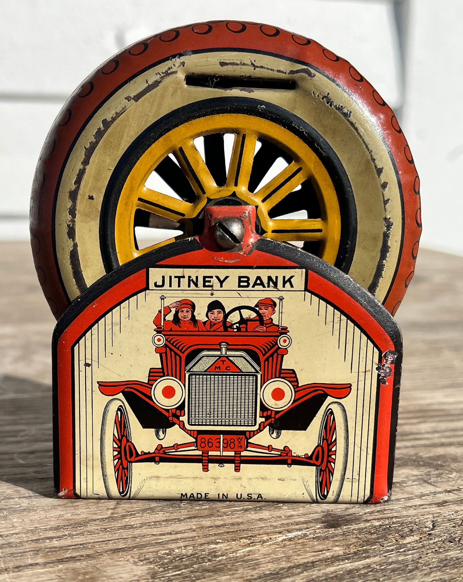 Model T Jitney Tin Mechanical Lithograph Bank (1 of 4)