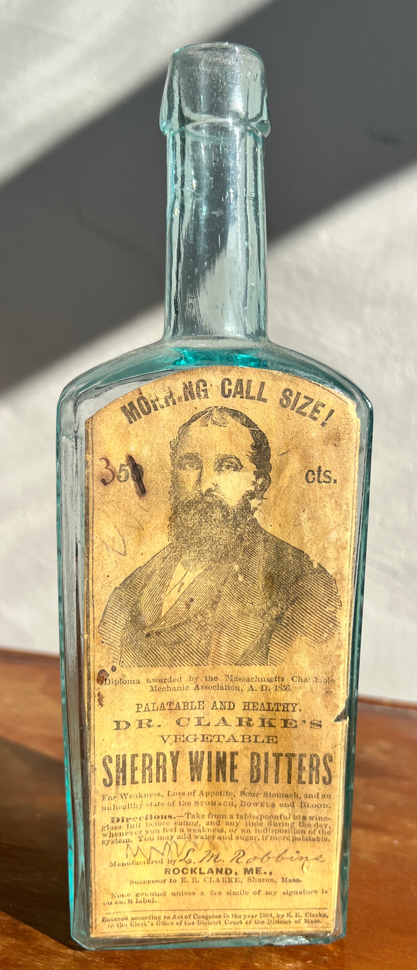 Dr. Clark's Sherry Wine Bitters Paper Label Advertising Bottle: Rockland Maine. Vegetable Sherry Wine Bitters Bottle. I do know how important condition is for bottle people and it is important. I am not an experienced bottle person. To minimize any condition confl