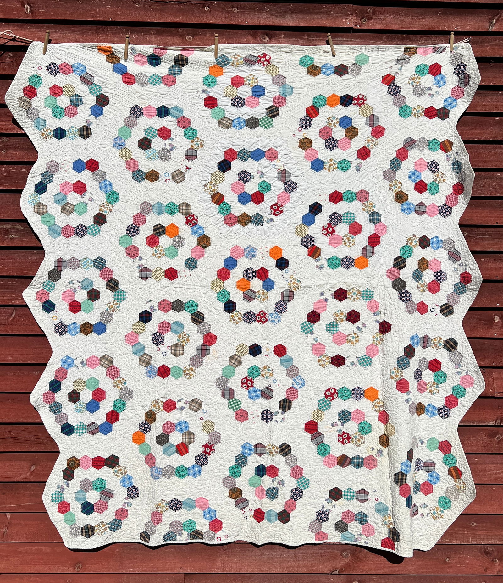 Colorful Blockchain Antique Quilt: Very nice blockchain pattern. Appox. 80 by 74.What's to Love - Lots of different material put into the blockchains.