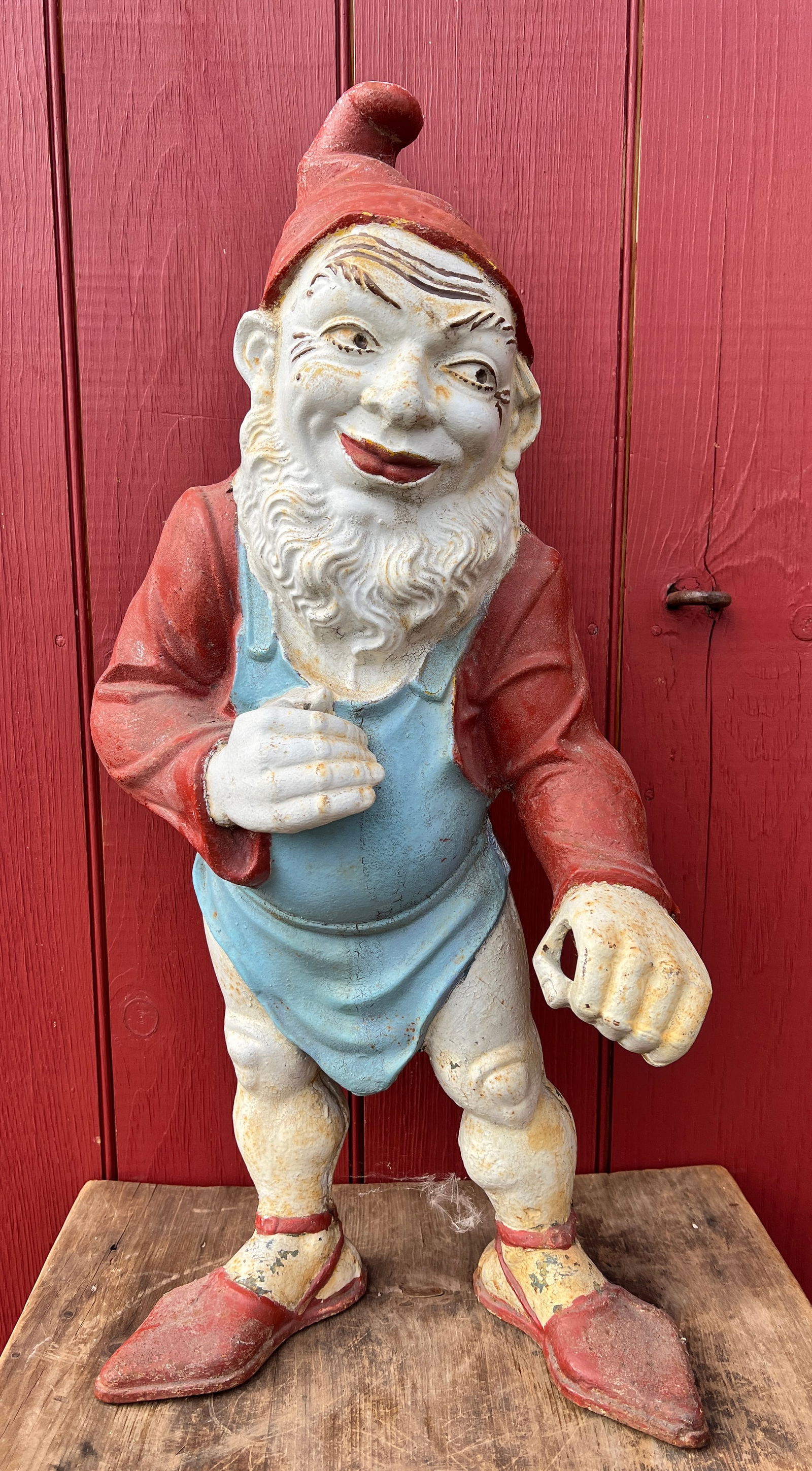 Large 25.5 inches Antique Cast Iron Garden Gnome in Paint: Approx 25.5 inches tall and good thick heavy cast iron. This is a good old one. What's to Love - Funny looking big feet.