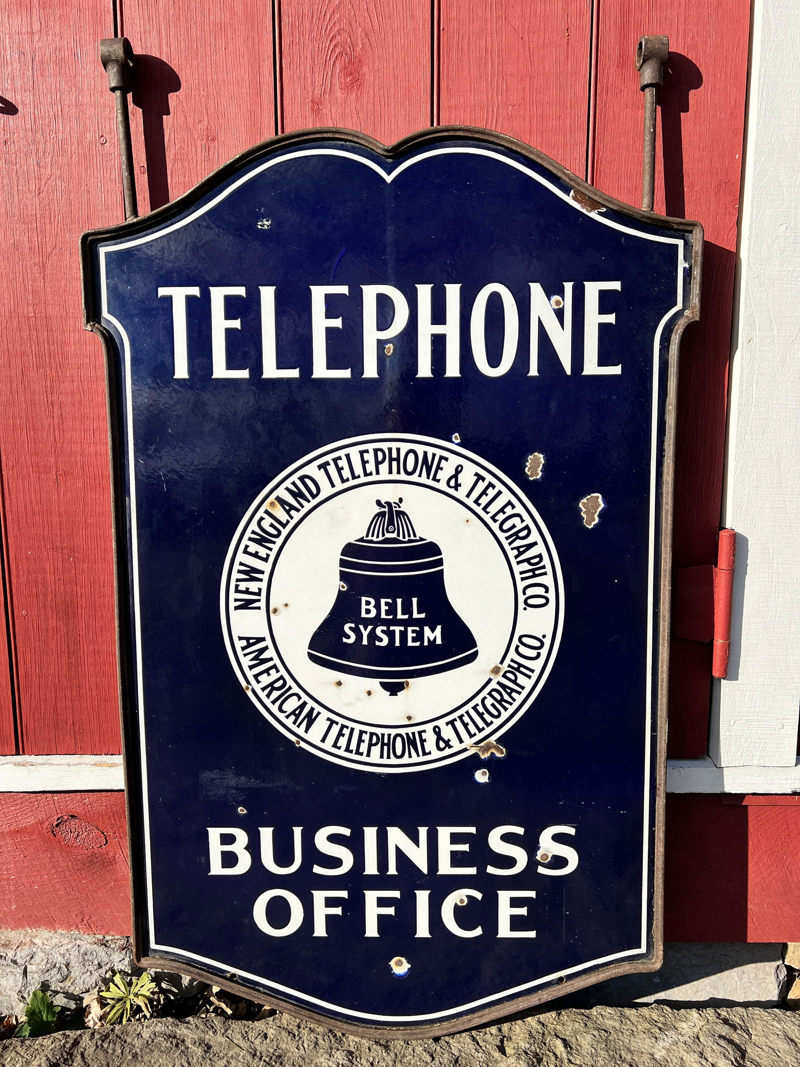 Bell System Large Bright Office Business Telephone Advertising Porcelain Sign: Large double sided figural New England Telephone & Telegraph Co. sign. With nice iron frame and hangers. What's to Love - Bright colors.