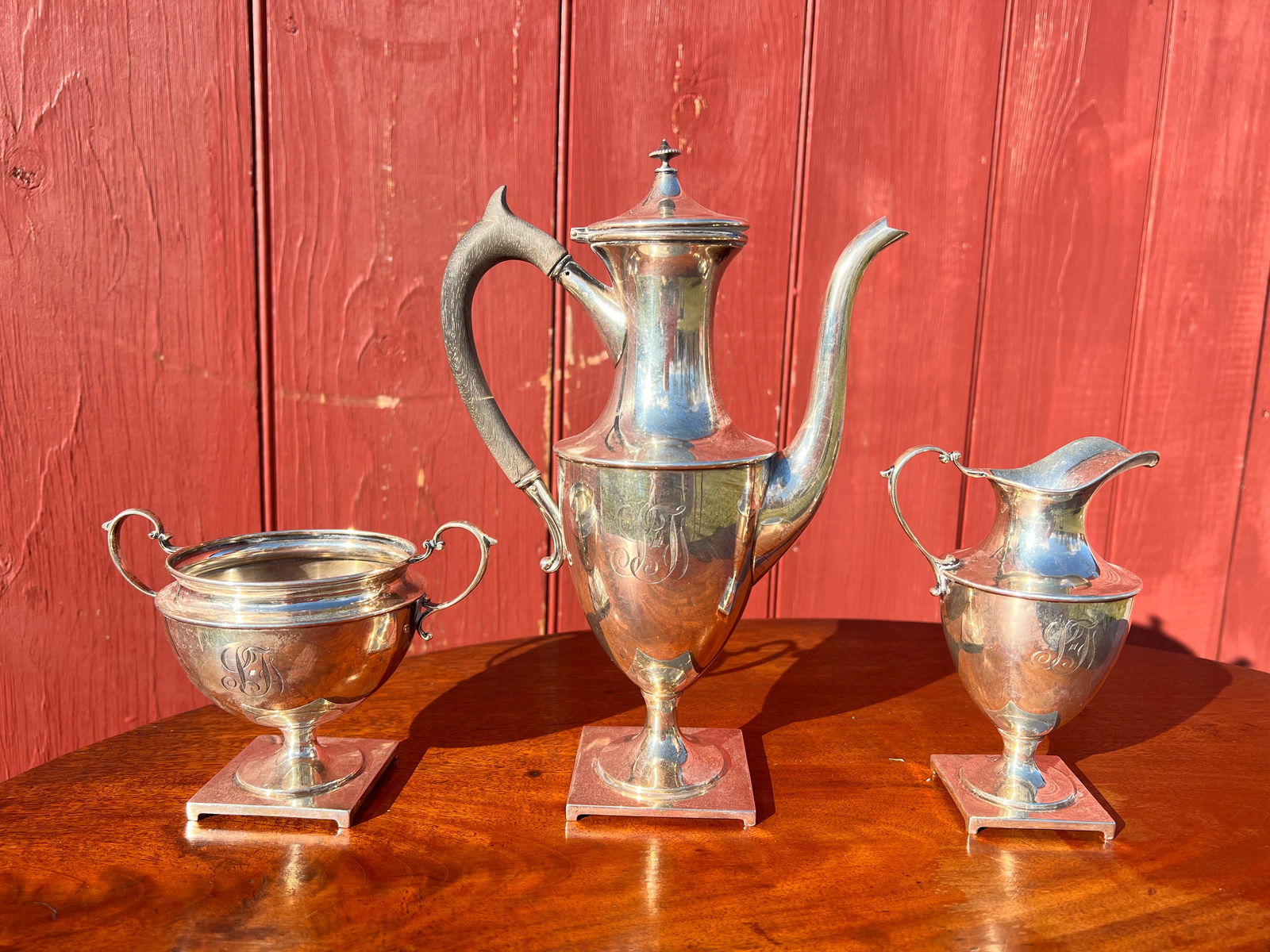 Antique American Sterling Silver Tea Set: All three pieces weigh 17.99 troy ounces. Marked Sterling and C F M Co. Monogrammed. What's to Love - It is elegant.