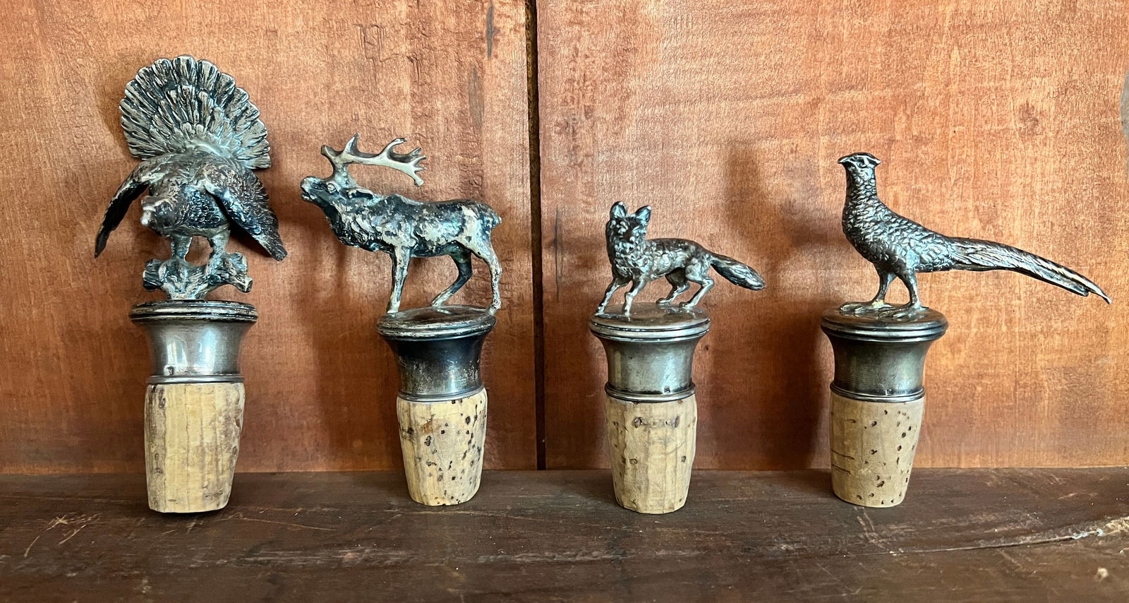 4 Circa 1880's Sterling Silver Figural Wine Corks of Animals - Great Detail: 3 to 4.5 inches tall. Wonderful set of 4 wine corks w/ figural animals w/ Elk, Fox, Turkey and Pheasant as shown. Great Detail. Marked w/ touch marks - most likely English. What's to Love - I like the