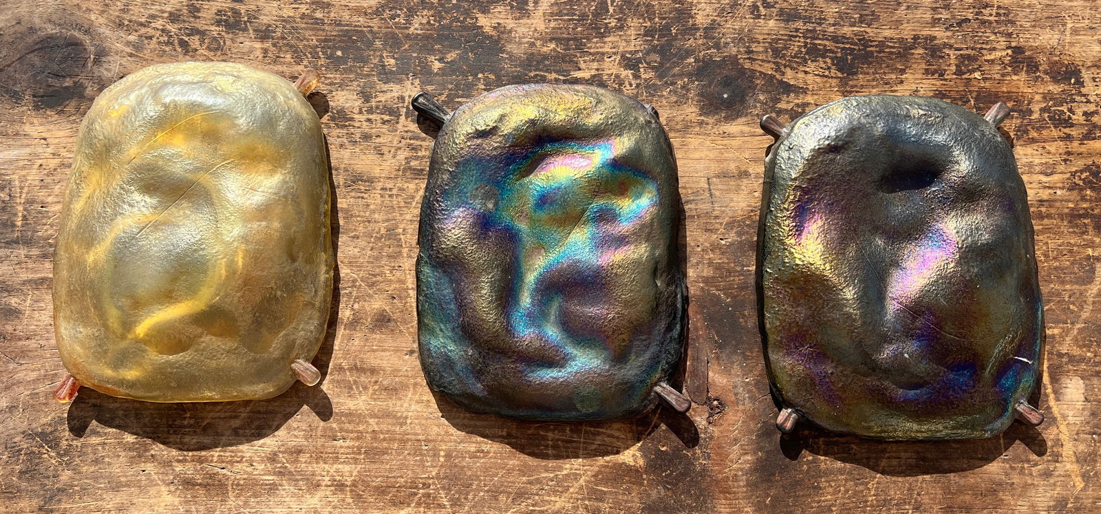 3 Tiffany Studios Iridescent Glass Turtle Back Panel Tiles: Very nice set of 3 arts and crafts tiles attributed to Tiffany Studios. Beautiful colors. Each tile Approx. 5.75 by 4.25 inches. What's to Love - The iridescent colors.