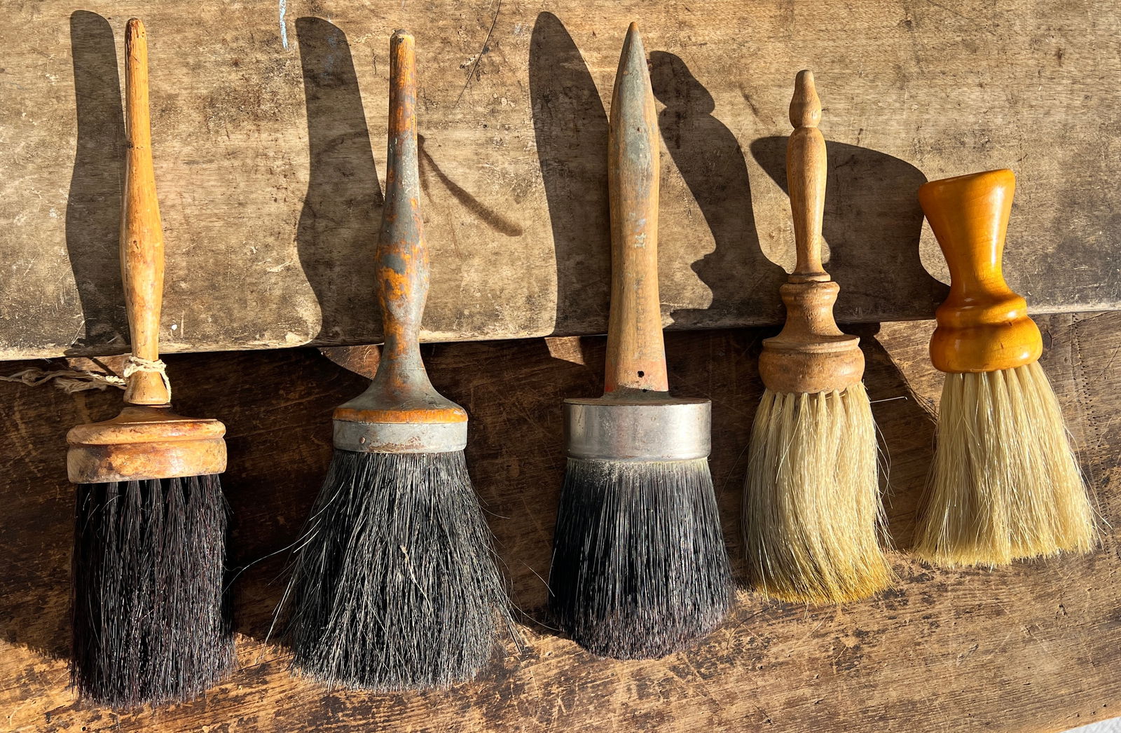 5 Antique Folk Art Paint Brushes One Shaker: One I do believe is a Shaker Brush. Most of them I do believe are for painting. High quality and very nice turnings. What's to Love - They made them to last back then.