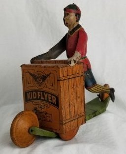 Kid Flyer ~ Wind-Up Tin Toy (1 of 8)