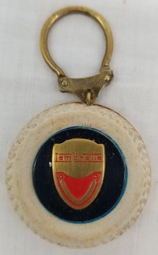 Vintage Labretta Key Chain: This is a very Cool Lambretta Key Chain, About 1 1/2 x 2 inches , we do in house shipping at cost, Fast and Easy, please ask any questions before you bid, follow me on Instagram Chasbach1 or Bach1 Auc
