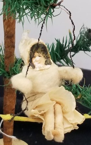 Old German Spun Cotton Girl on Swing Ornament: a great old spun cotton, dates to the early 1900s, about 2 inches tall