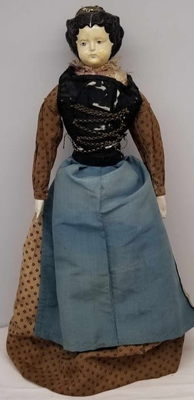 Paper Mache Shoulderhead ~ German 1870s: papier-mâché shoulderhead, wooden lower arms, cloth body, painted and elaborately carved brown hair, Painted features and boots. Originally Dressed in south German traditional costume, Probably Bade