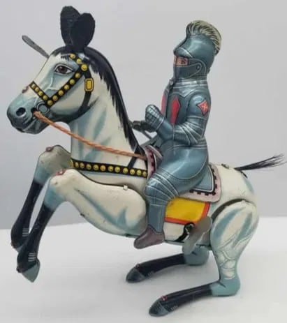 Knight on Horseback Tin wind-up toy: a nice old Japanese tin wind-up toy, the wind-up mechanism works well, about 7 inches long