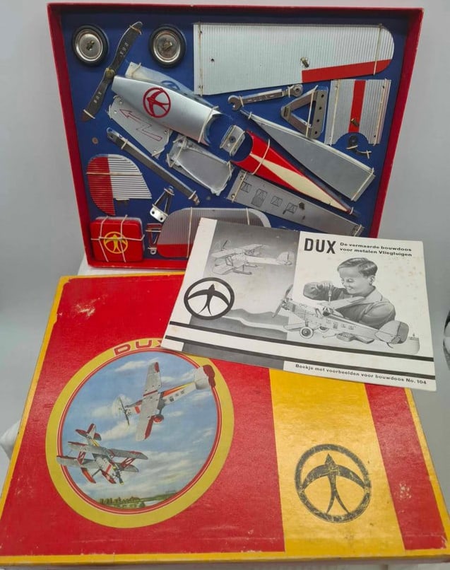 DUX 104 Tin Toy Airplane ~ Original Box and Instructions: Mint in Box, all parts are there are still tied in the box, it has the original manual, box is about 11 x 14 inches