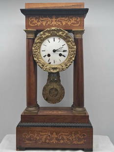 French Portico Clock circa 1840: This is a lovely French portico clock, it dates to the middle of the 1800s, well cast mounts probably Bronze, it is in need of repair, the springs are good and it runs when wound, but the "Suspension