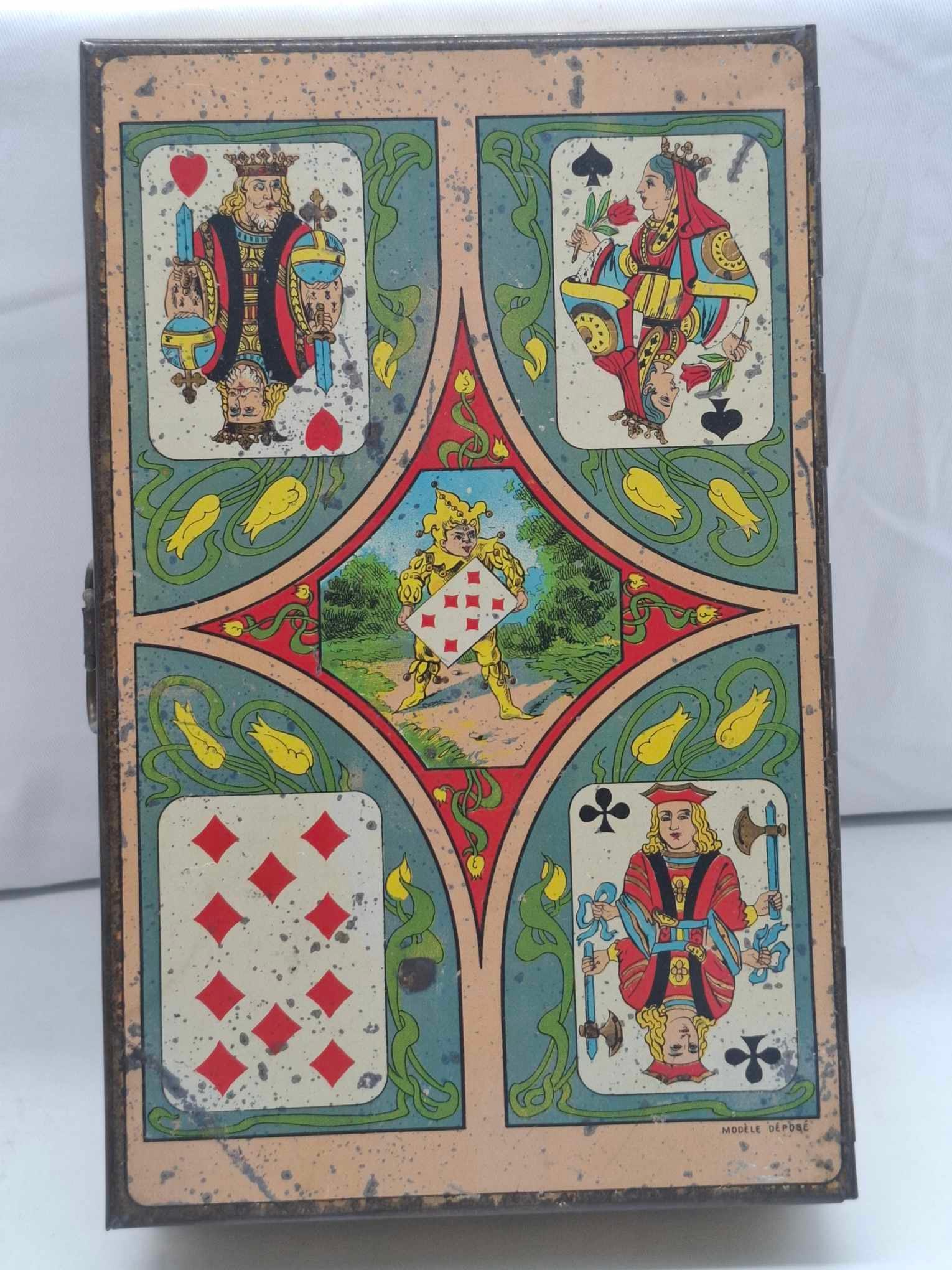 French Chocolate Tin circa 1880: a beautiful tin, games on the outside, about 6 x 9 1/2 x 2 1/2 inches, great color
