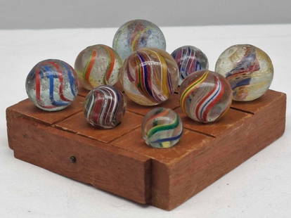 Antique Solitaire w 9 Handmade German Marbles circa 1900: very nice old game, board is about 3 3/8 inches across, 9 antique German Handmade marbles, range from about 1.4 cm to 2.4 cm
